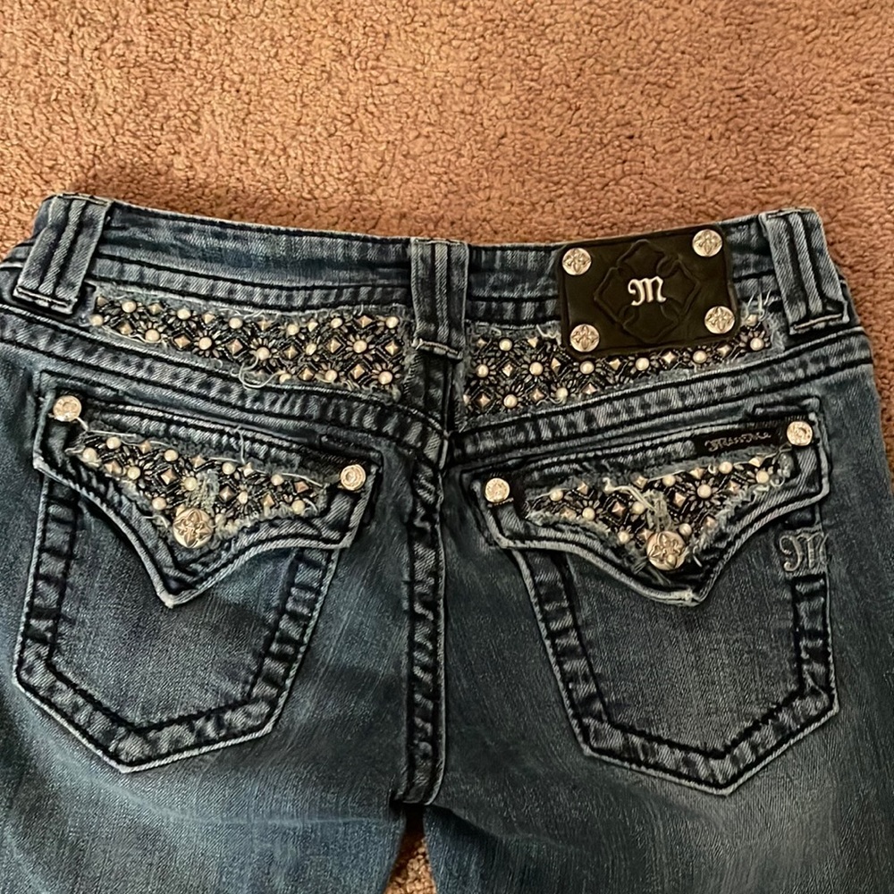 Medium wash bootcut Miss Me jeans. NWOT